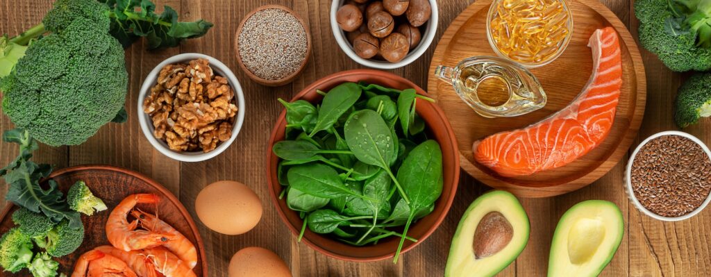 Whole foods rich in B-vitamins — eggs, salmon, leafy greens, meat, nuts, and whole grains.